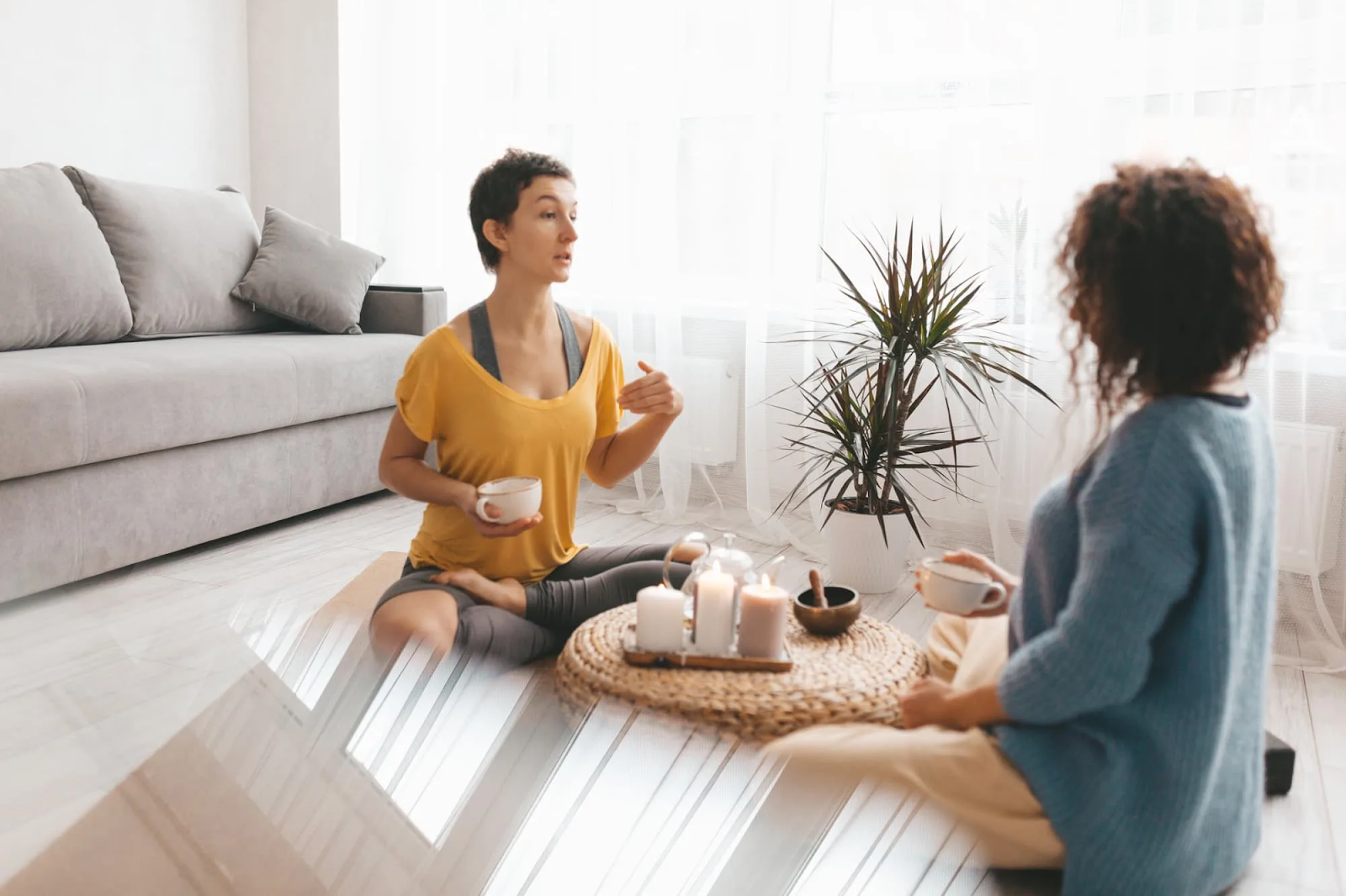 Female life coach having a conversation with her coaching client.